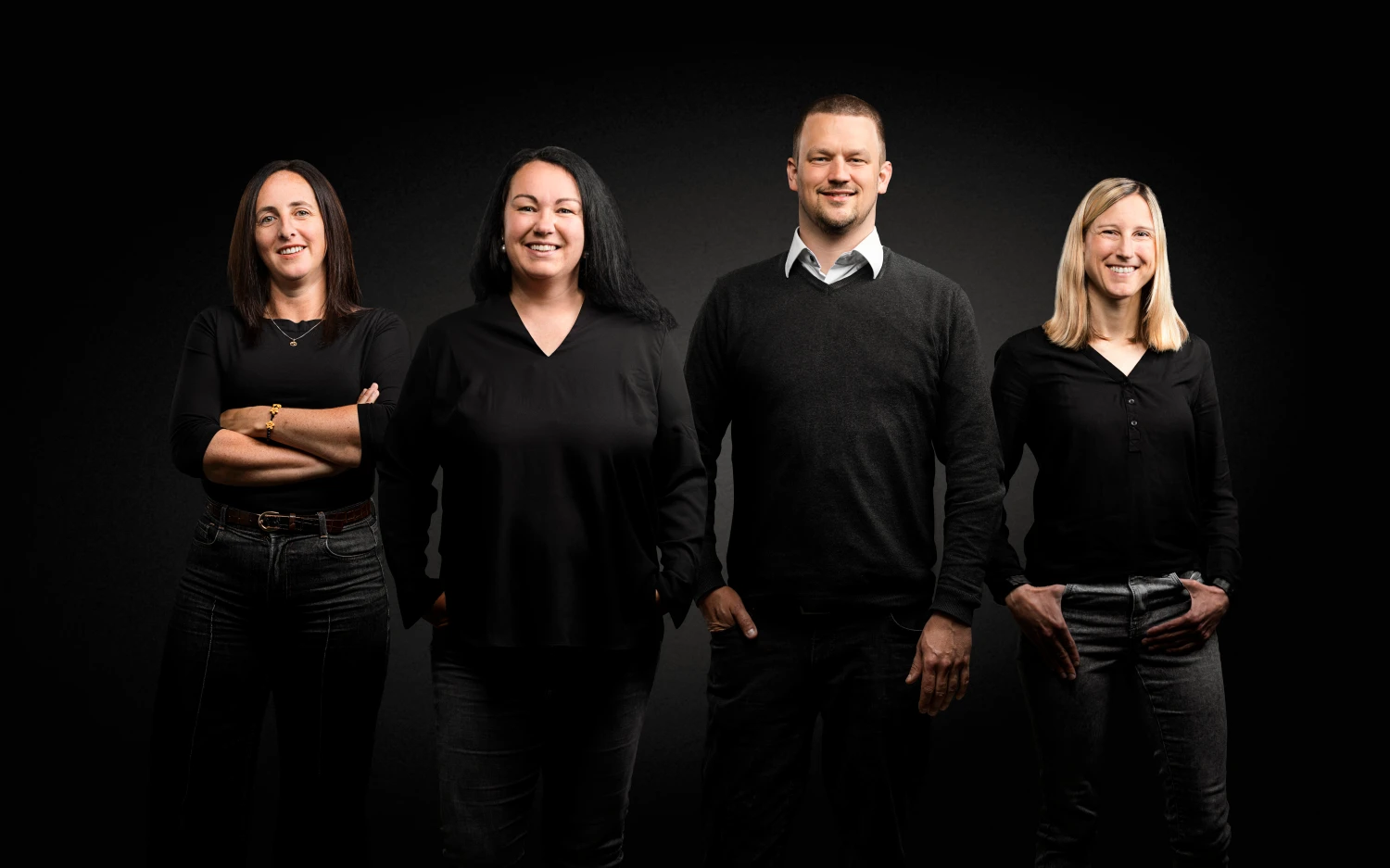 Gruppenfoto der 4 Teammitglieder.